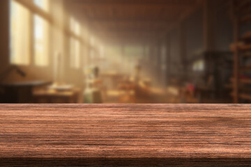A beautiful warm light fills the interior of a workshop or studio, with a wooden countertop in the foreground.