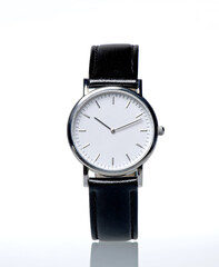 Modern watch with a sleek black leather strap and a minimalist white face. Timeless design appealing to both men and women. Perfect accessory for any occasion. AI