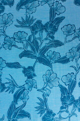 Vibrant Blue Fabric Texture with Tropical Floral Monochrome Design