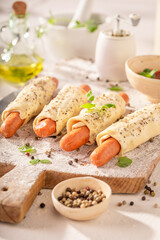 Tasty hot dogs baked in home kitchen.