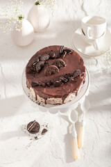 Sweet cheesecake with chocolate and dark cookies.