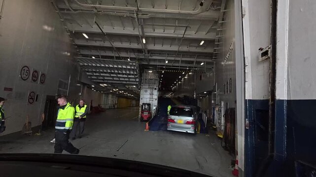 timelapse movie of car boarding procedure on a sea ferry 