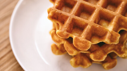 Homemade gluten free waffles on a plate. Close up.