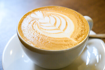 Cappuccino coffee cup showing beautiful latte art