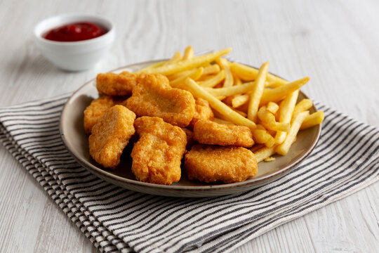 Chicken Nuggets served with French Fries and Ketchup