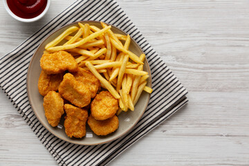 Chicken Nuggets served with French Fries and Ketchup