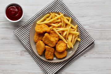 Chicken Nuggets served with French Fries and Ketchup
