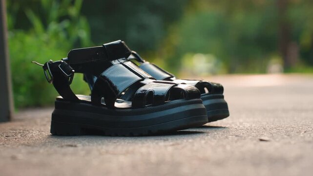 silent footprints stay as dusk settles in, quietly abandoned shoes remain as daytime ends and night begins, unheard footsteps and deserted shoes linger silently as dusk falls into darkness