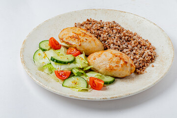 Delicious stuffed dumplings pair perfectly with fresh salad and nutritious buckwheat blend