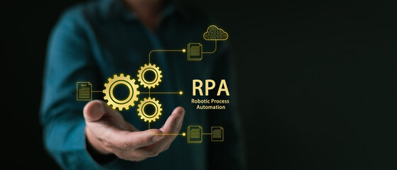 business professional showcasing RPA with glowing gear icons and digital workflow, symbolizing robotic process automation, efficiency, data integration, and advanced technology in modern operations.