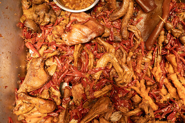 Assorted poultry parts at Chinese street food stall