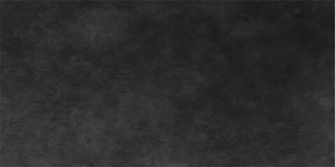 A dark grunge texture background of aged, rough black paper with a vintage blank wall pattern © PAGLAA