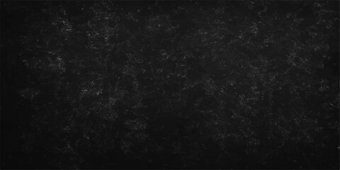 A textured, black, and white vintage wall design with a dark, rough paper surface and old, blank stone frame pattern