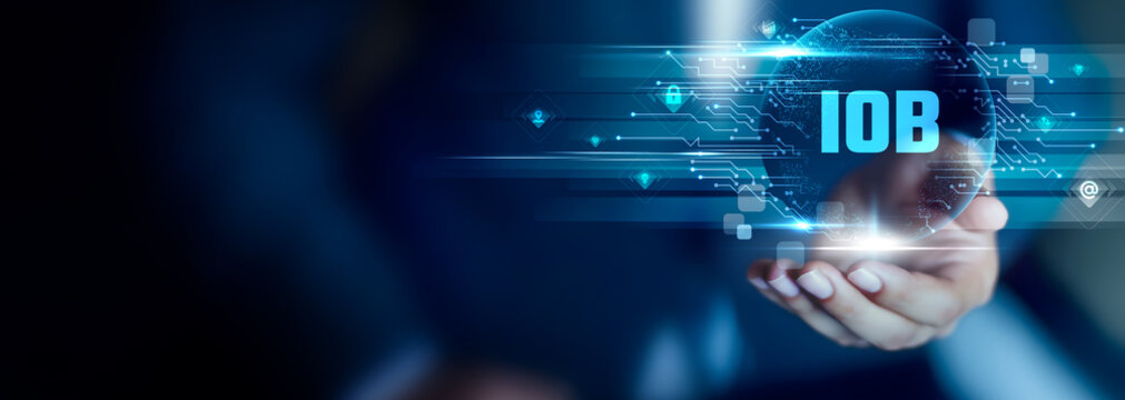 IOB concept, Businessman hold IOB text. behavior tracking, data insights, user patterns, smart analytics, personalized actions, digital observation