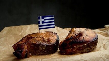 Close up of grilled fish with Greek flag, composition emphasizes local Mediterranean catch and Greek seaside tavern tradition. - Powered by Adobe