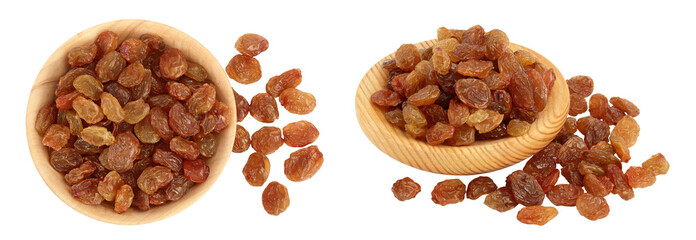 Brown raisins in wooden bowl isolated on white background . Top view. Flat lay