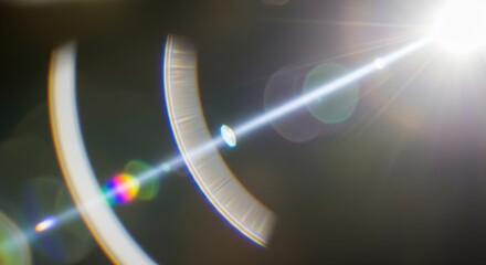 Bright lens flare with rainbow effect, abstract background with copy space