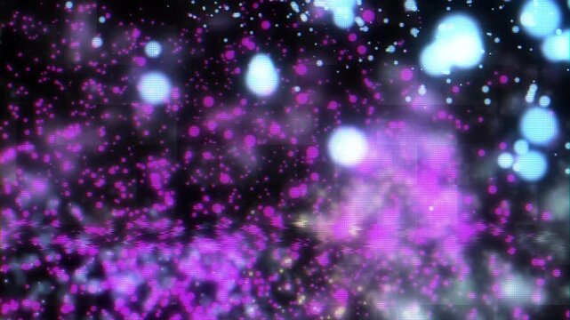 Abstract background color particles. Vibrant blue and purple particles scatter across a dark cosmic-like background. Overlay animation