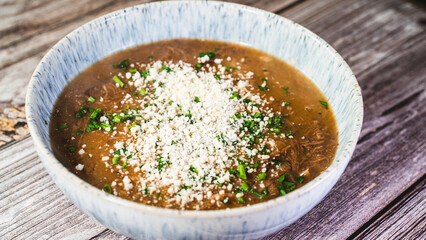 Hearty thick rib soup with tender cassava chunks, served in a rustic bowl. Comforting, flavorful,...
