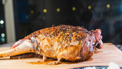 Whole roasted lamb leg with golden herb crust, served with cassava and olives. Juicy, tender, and ready to carve. A complete festive meal on a board.