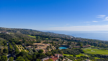 Aerial shot along the coastline at the Pelican Hill Resort in Newport Beach California USA