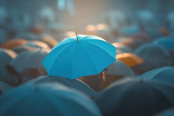 A vibrant blue umbrella stands out atop a cluster of gray umbrellas in a bustling cityscape, illuminated by soft, diffused sunlight, evoking a sense of security and optimism