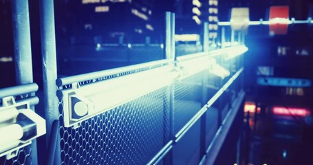 Bright neon lights softly illuminate a sleek urban walkway at night, casting a futuristic glow over the mesh barrier. Tall buildings loom in the background, creating an enchanting ambiance. - Powered by Adobe