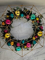 Modern Geometric Christmas Wreath with Colorful Ornaments