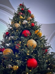 Festive Christmas Tree with Red and Gold Ornaments