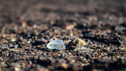 Fragment of Ice on Rocky Surface