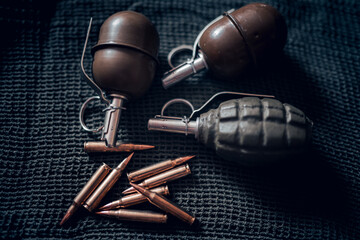 grenades and bullets on fabric