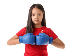 Little Asian girl in boxing gloves with yellow ribbon on white background. Childhood cancer...