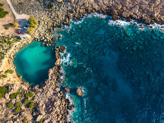 Aerial view of of a small sea crater surrounded by rocks, Voulolimni, Crete
