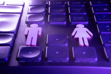 Gender symbols on a computer keyboard, highlighting the importance of inclusivity and...