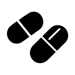 Black and white illustration of two capsules or pills on a plain background