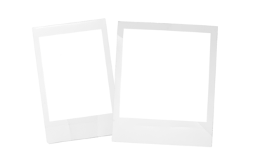 Two tilted overlapping white instant photo frames isolated