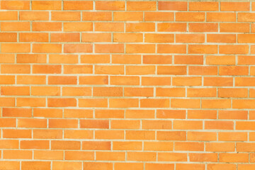 Orange brick wall pattern creating textured background