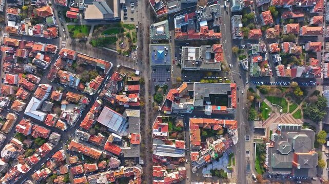 Aerial view of the elegant old quarters of Burgas, Bulgaria. Historic townscape with beautiful classic architecture, charming streets and picturesque rooftops captured from above.