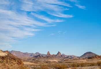 Mules Ears Formation Rises From The Undulating Ridge In Big Bend
