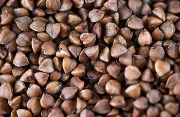 Close up of Buckwheat Grains in Bamboo Spoon