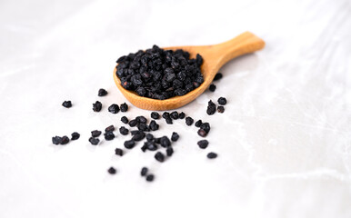 Dried Elderberry Berries on White Background