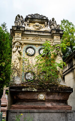 Monumental and ornated graves in the Cemetery of Pere Lachaise, largest cemetery in Paris, France, where many famous artists are buried.