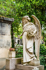 Monumental and ornated graves in the Cemetery of Pere Lachaise, largest cemetery in Paris, France, where many famous artists are buried.