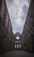 Fototapeta premium Abbey of San Galgano with collapsed roof after a lightning strike on the bell tower. October 2022