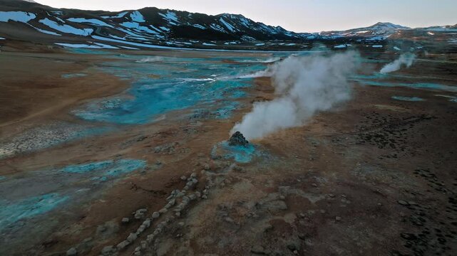 Drone footage of Hverir geothermal area near Lake M&yacute;vatn, North Iceland. Steam vents and mud pots bubble in the evening light.