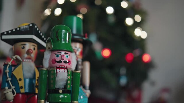 Classic Nutcracker Figures with Blurry Christmas Tree Lights Background