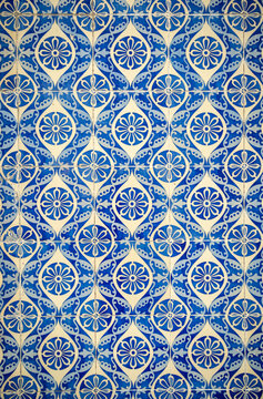 Abstract background of traditional and historic colourful Portuguese ceramic tiles with a geometric floral pattern called azulejos