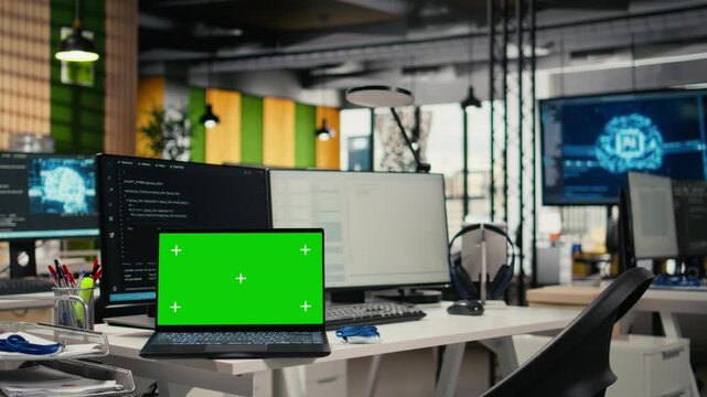 Isolated screen laptop on office desk used to implement algorithms enabling machine learning. Artificial intelligence technology company workspace with mockup notebook used to conduct code reviews