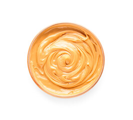 Bowl with tasty peanut butter on white background