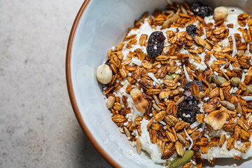 Granola with Greek yogurt, berries, nuts and seeds